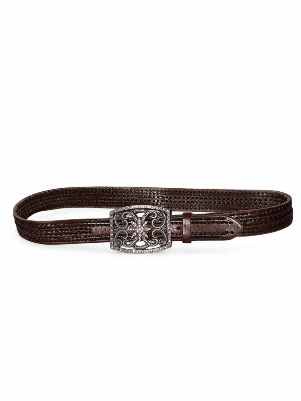 Brown leather belt with silver buckle featuring ornate scrollwork and rhinestone